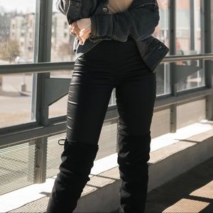 Coated black jeans